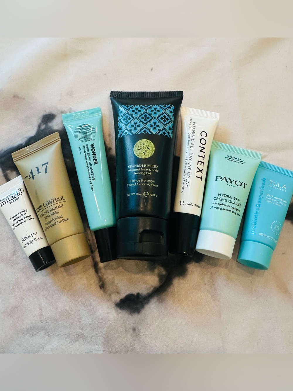NWT Self-Care Bundle: Face & Body Bronzing Elixir, Eye Cream, Mud Mask, Creams